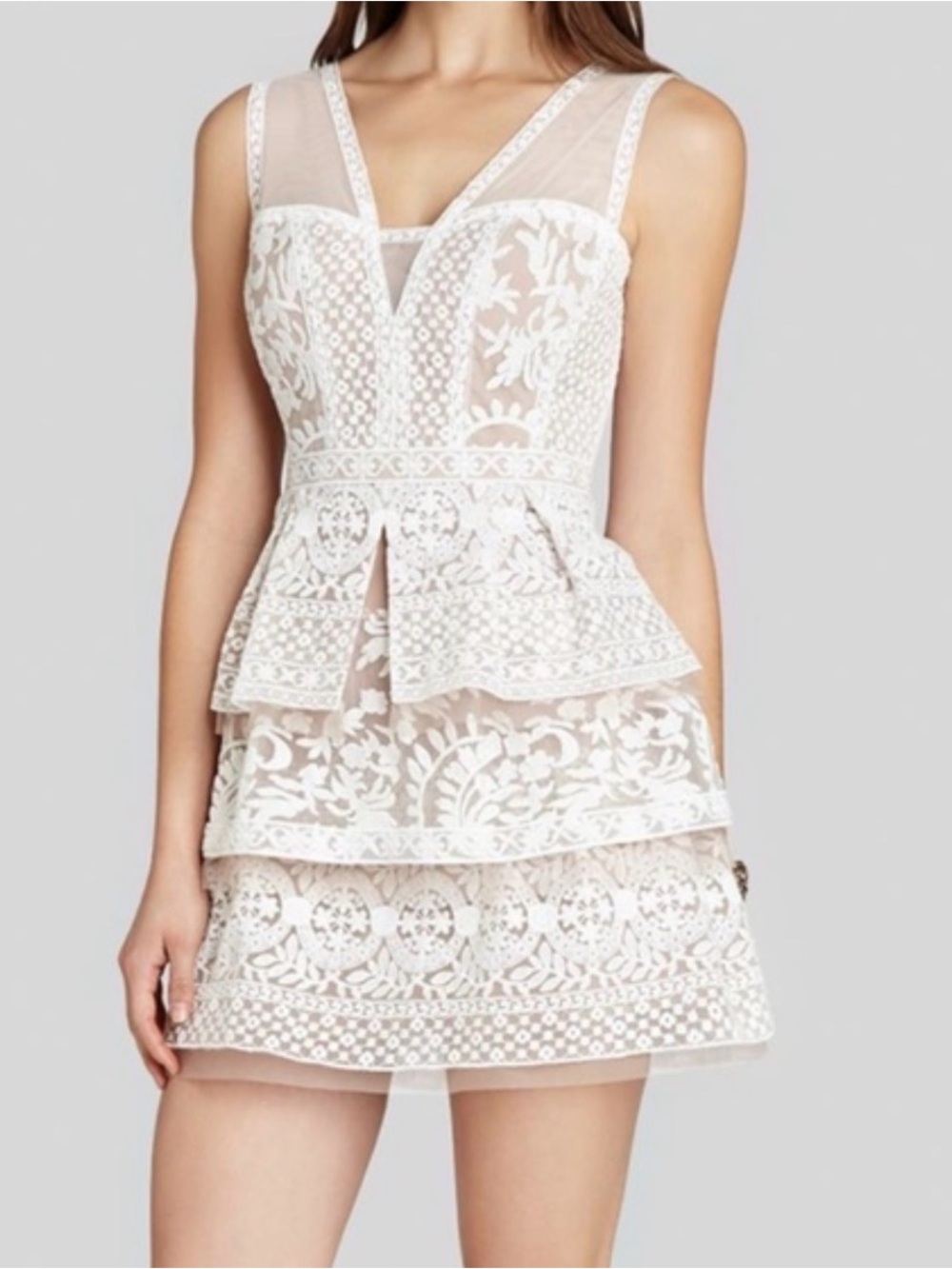 Sleeveless White Lace Peplum Mini Dress